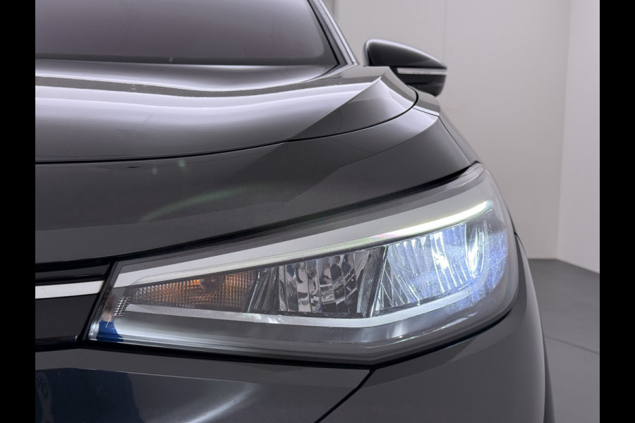 Volkswagen ID.4 204pk 1st 77kWh Trekhaak Leer/Alcantara Adap.Cruise Camera Warmtepomp Apple Carplay Android Navi Ecc Pdc-a+v Lmv 20" Stoelverwarming Led Bordherkenning Voor-Klimatisering Semi-Autopilot  Elektrisch-Wegklapbare Trekhaak App-Connect  E-sound Front-Assist Origineel Nederlandse Auto SOH 86%