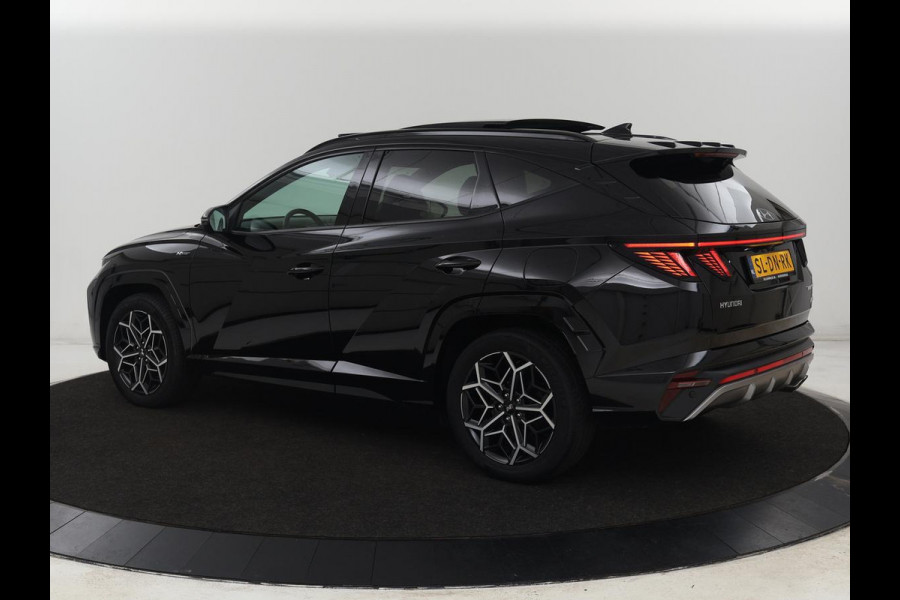 Hyundai Tucson 1.6 T-GDI PHEV N Line Sky 4WD | Panoramadak | Stoelverwarming | Leder/Alcantara | Camera | Adaptive cruise | Carplay | Full LED | Stuurverwarming | Keyless | Plug In