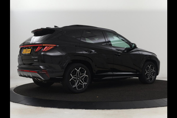 Hyundai Tucson 1.6 T-GDI PHEV N Line Sky 4WD | Panoramadak | Stoelverwarming | Leder/Alcantara | Camera | Adaptive cruise | Carplay | Full LED | Stuurverwarming | Keyless | Plug In