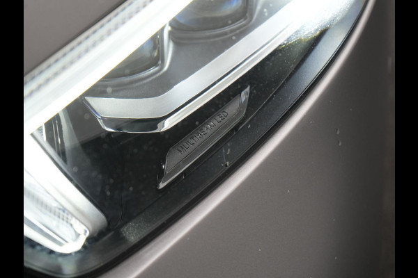 Mercedes-Benz A-Klasse 250 e Business Solution AMG Limited Plug In Hybrid 218pk PHEV | Adaptive Cruise | Head Up | Multi Beam LED | Alcantara Sportstoelen Verwarmd | Night Pakket | Sfeerverlichting | MBUX | Apple Carplay | Widescreen Navi | 19"L.M | Mountaingrau Magno |