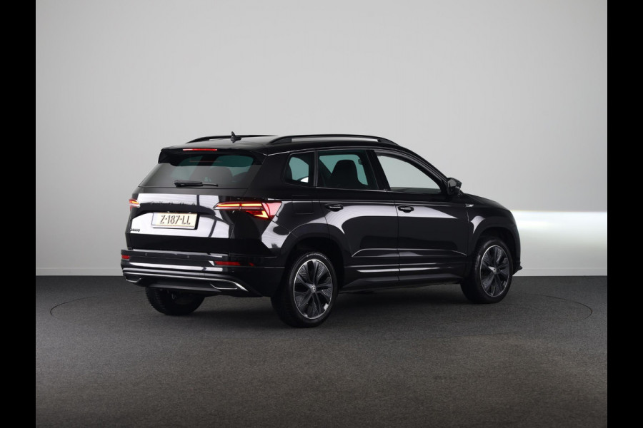 Škoda Karoq 1.5 TSI ACT Sportline Business 150 pk Automaat (DSG) | Verlengde garantie | Navigatie via App | Parkeersensoren | Achteruitrijcamera | Adaptieve cruise control | Stoelverwarming |