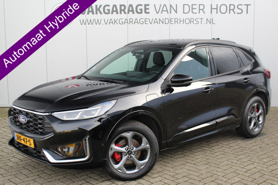 Ford Kuga 2.5-243pk PHEV ST-Line X. Trekgewicht 2.100kg. Nieuw Model ! Van €. 54.937,- voor €. 43.735,- Trekgewicht van 2.100kg ! Elektr. panodak., elektr. trekhaak, stoel-, stuur- en voorraamverw., 360gr. Camera, HUD, AppleCarplay/Androidauto, Elektr. verstelb. comfortstoelen, LED verl.