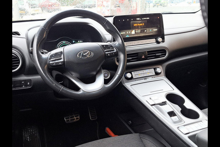 Hyundai Kona EV Comfort 64 kWh | SOH: nnb | 3 Fase | Warmtepomp | Trekhaak | Navi | Adaptive CC | Climate |