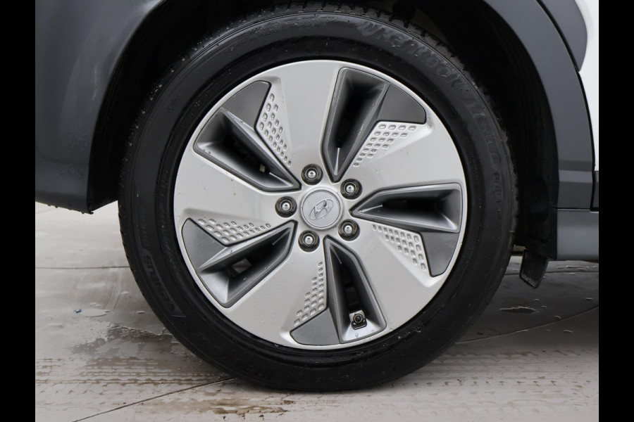 Hyundai Kona EV PREMIUM SKY 64 KWH + SCHUIFDAK | LEDER | TREKHAAK | STOELVENTILATIE | HEAD-UP | CAMERA | ADAPTIVE CRUISE CONTROL