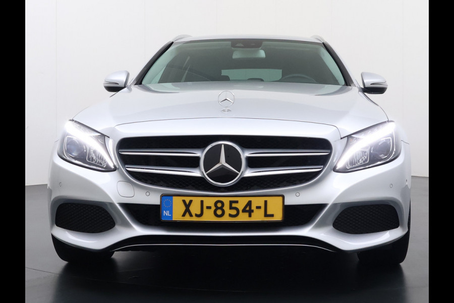 Mercedes-Benz C-Klasse Estate 180T AUT-9 157PK Premium Plus Trekhaak Adap.Cruise Distronic Plus Navi Ecc Pdc Led Stoelverwarming Elek.Stoelen Elek.Achterklep Isofix Lmv 19" Bluetooth