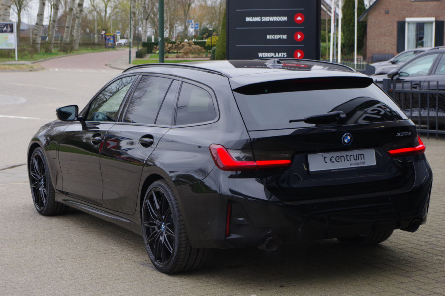BMW 3 Serie Touring 330e xDrive 293 PK High Executive M-Sport PHEV, Kuipstoelen, Panoramadak, Memory, Head-up