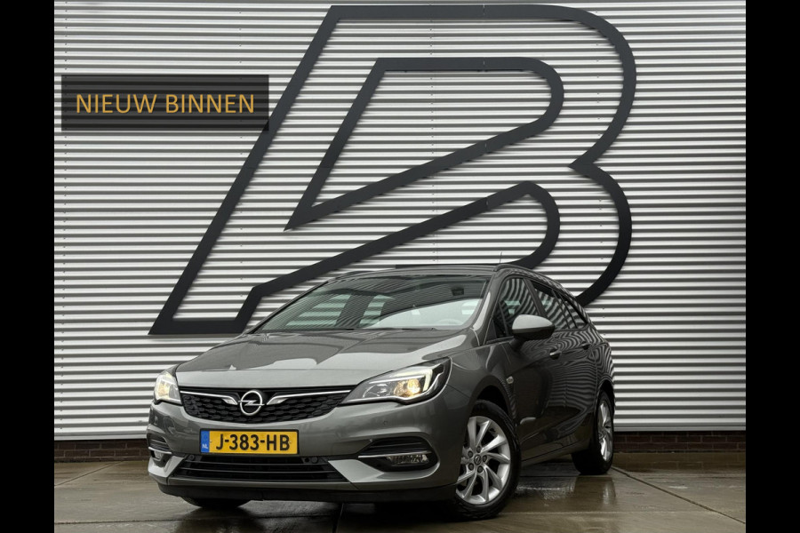 Opel Astra Sports Tourer 1.2 Business Edition 2e Eigenaar,Apple Carplay,Airco,Camera,Cruise,PDC,Trekhaak,N.A.P,APK tot 07-2026