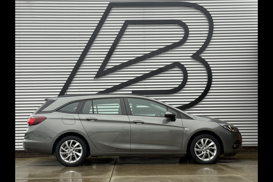 Opel Astra Sports Tourer 1.2 Business Edition 2e Eigenaar,Apple Carplay,Airco,Camera,Cruise,PDC,Trekhaak,N.A.P,APK tot 07-2026