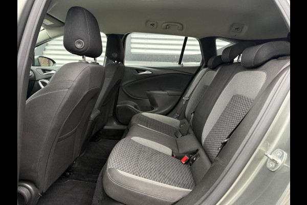 Opel Astra Sports Tourer 1.2 Business Edition 2e Eigenaar,Apple Carplay,Airco,Camera,Cruise,PDC,Trekhaak,N.A.P,APK tot 07-2026