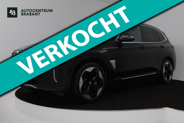 BMW iX3 High Executive 80 kWh (PANORAMADAK, SoH 97.7% TREKHAAK, SFEERVERLICHTING, STOELVERWARMING, ACHTERUITRIJCAMERA, NAVIGATIE)