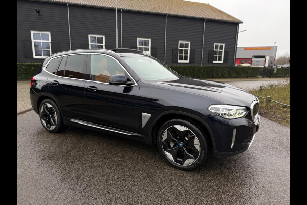 BMW iX3 High Executive 80 kWh SOH 97% PANORAMADAK/HEAD-UP/HARMANKARDON/ /TREKHAAK/LEER FULL-LED/360" CAMERA |