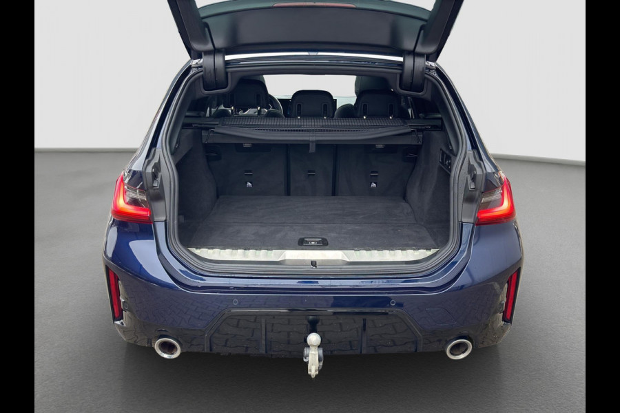 BMW 3 Serie Touring 320e M-Sport | Pano | Trekhaak | Harman Kardon | 19 inch | Sfeerverlichting | Camera | Dealer onderhouden