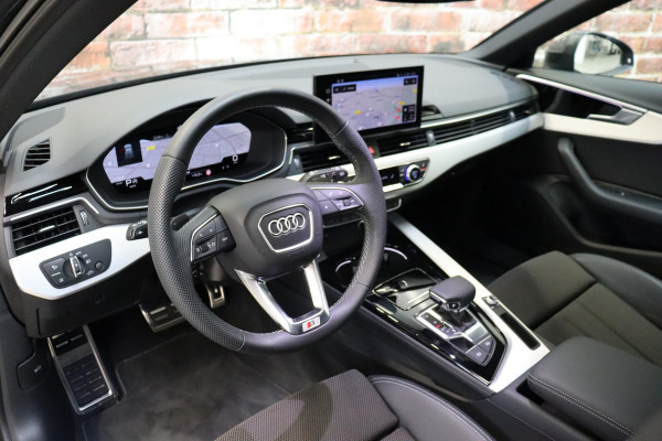 Audi A4 Avant 35 TFSI S Edition Competition Automaat / Panoramadak / Optic Black / Adaptieve Cruise Control / 18 Inch / LED / Stoelverwarming / Navigatiesysteem / Achteruitrijcamera / Extra Getint Glas / Climate Control