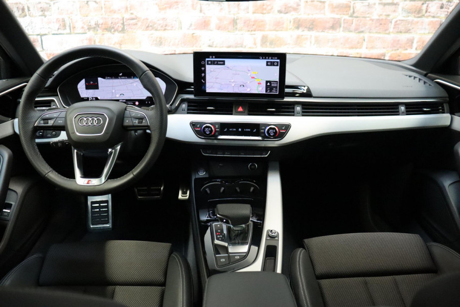 Audi A4 Avant 35 TFSI S Edition Competition Automaat / Panoramadak / Optic Black / Adaptieve Cruise Control / 18 Inch / LED / Stoelverwarming / Navigatiesysteem / Achteruitrijcamera / Extra Getint Glas / Climate Control