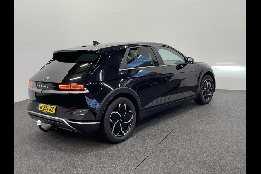 Hyundai IONIQ 5 Style 58 kWh SOH 98% Warmtepomp Airco ECC Navi Carplay Virtual Dashboard Trekhaak PDC VA+ Camera Full LED Adaptive Cruise 19" Velgen