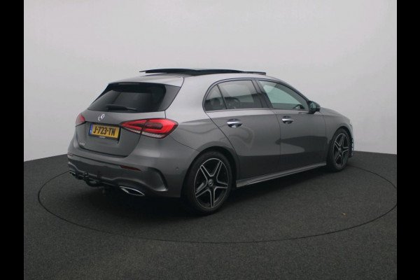 Mercedes-Benz A-Klasse 180 Business Solution AMG AMG Line | Night Pakket | Panorama Schuif-Kanteldak | Sfeerverlichting | Trekhaak | MultiBeam Koplampen | Achteruitrijcamera. Inclusief 24 maanden Mercedes-Benz Certified garantie voor Europa.