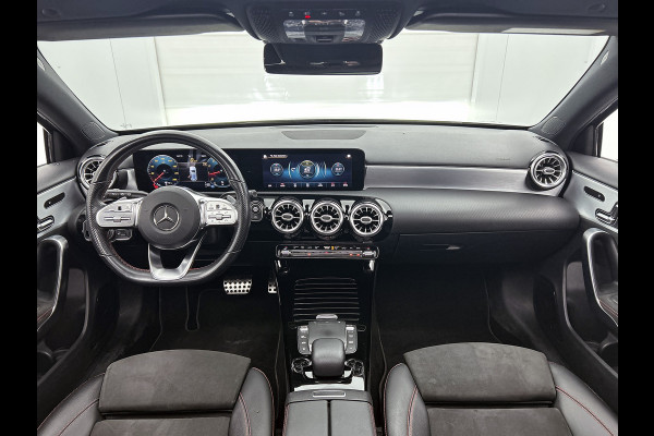 Mercedes-Benz A-Klasse 180 Business Solution AMG AMG Line | Night Pakket | Panorama Schuif-Kanteldak | Sfeerverlichting | Trekhaak | MultiBeam Koplampen | Achteruitrijcamera. Inclusief 24 maanden Mercedes-Benz Certified garantie voor Europa.