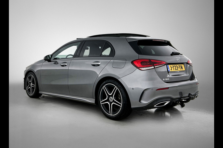 Mercedes-Benz A-Klasse 180 Business Solution AMG AMG Line | Night Pakket | Panorama Schuif-Kanteldak | Sfeerverlichting | Trekhaak | MultiBeam Koplampen | Achteruitrijcamera. Inclusief 24 maanden Mercedes-Benz Certified garantie voor Europa.