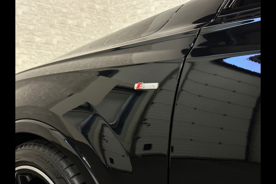 Audi Q7 55 TFSI e S-Line | Panorama | Leder | Luchtvering | LED-Matrix | Keyless-Go | 22 inch | Memory | Stoelverwarming V+A | Camera | Virtual-Cockpit | 3-Zone Clima | Draadloos Laden | Standkachel | Getint Glas |