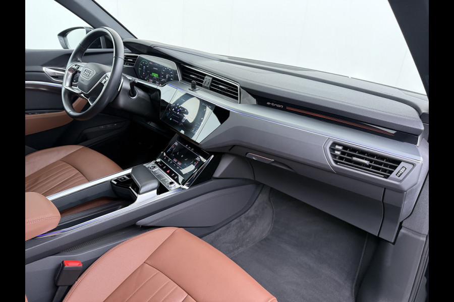 Audi e-tron 55 Quattro 95kWh 408PK Elektr.Leer+Verwarmd Pano-Dak Trekhaak Luchtvering Adap.Cruise Navi Ecc Stoelverwarming Business edition  SOH 93% LED Lmv Elek.Achterklep Privacy Glas Keyless Zwarte Hemel 1e Eigenaar 1.800KG Trekgewicht Zeer compleet! Volledig Dealer Onderhouden, net Beurt gehad bij Audi!