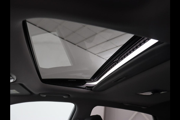 Hyundai Kona EV Limited 64 kWh | Schuifdak | Leder | Trekhaak | Stoelventilatie | Head-Up | Carplay | Warmtepomp | Achterbankverwarming | Navigatie | Camera | Full LED | Keyless