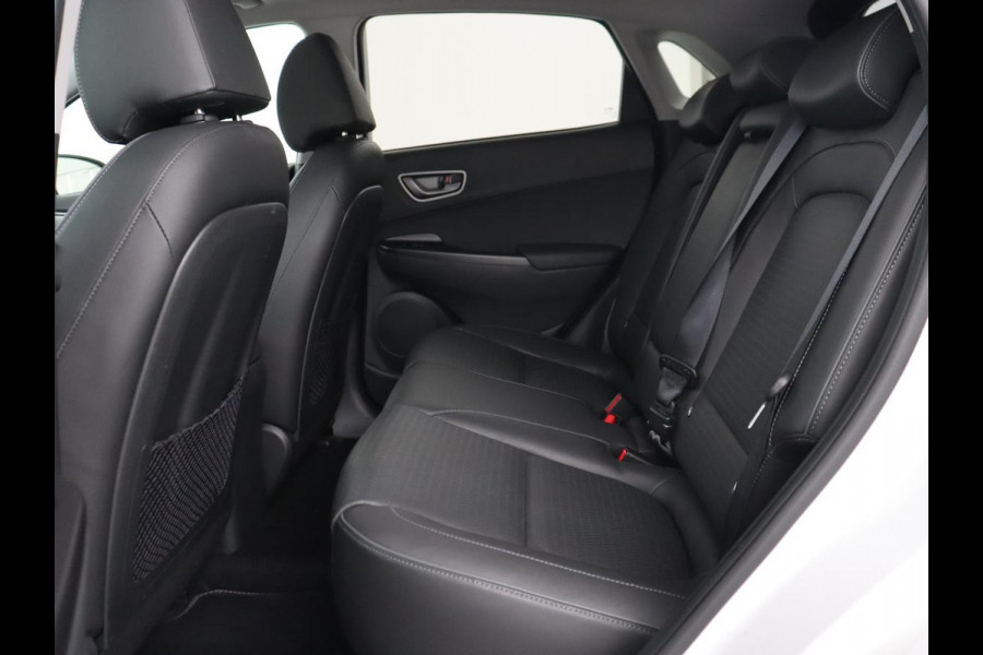 Hyundai Kona EV Limited 64 kWh | Schuifdak | Leder | Trekhaak | Stoelventilatie | Head-Up | Carplay | Warmtepomp | Achterbankverwarming | Navigatie | Camera | Full LED | Keyless