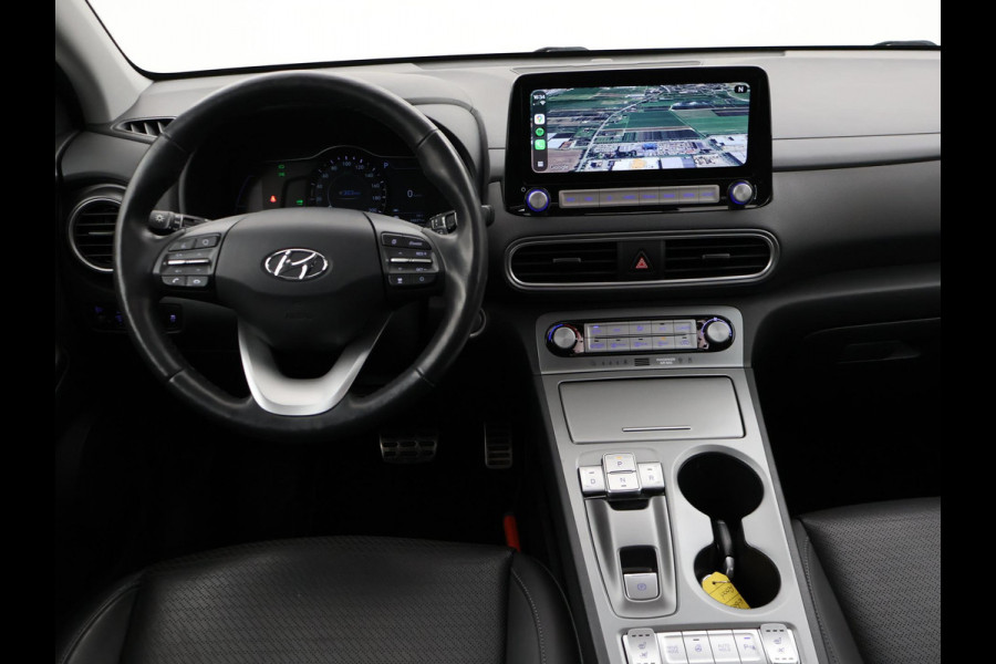 Hyundai Kona EV PREMIUM SKY 64 KWH + SCHUIFDAK | LEDER | STOELVENTILATIE | STUURVERW. | STOELVERW.