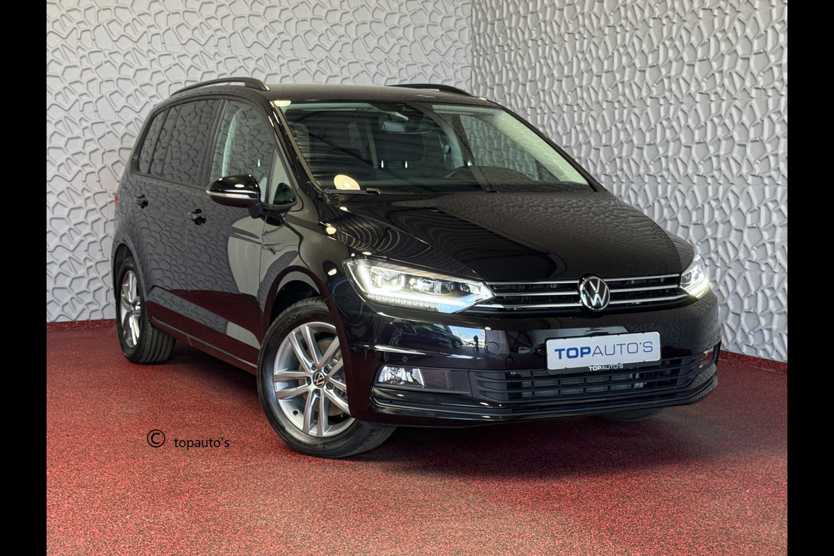 Volkswagen Touran 1.5 TSI 150PK 7P CARPLAY NAVI CAMERA LED ELEK.KLEP VIR.COCKPIT DODE.HOEK DET. STOELVERW KEYLESS 7P 7PERS 10/2024 "Volkswagen rijden begint bij Topautos.nl – 75 topmodellen direct op voorraad!"