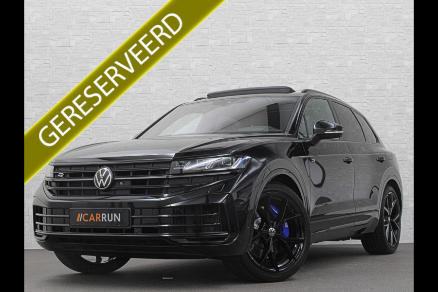 Volkswagen Touareg R 3.0 TSI 462PK E-Hybrid | Luchtvering | Puglia-Leder | Panorama | DYN-Audio | Massage | Ventilatie | ACC | Trekhaak | Nachtzicht | Head-Up | Ergo-Comfort | 22" | Keyless-Entry | Memory | 4-Zone Clima | ISO-Glas | Stoelverwarming V+A | Dodehoek | Standkachel | Carplay | Draadloos Laden |