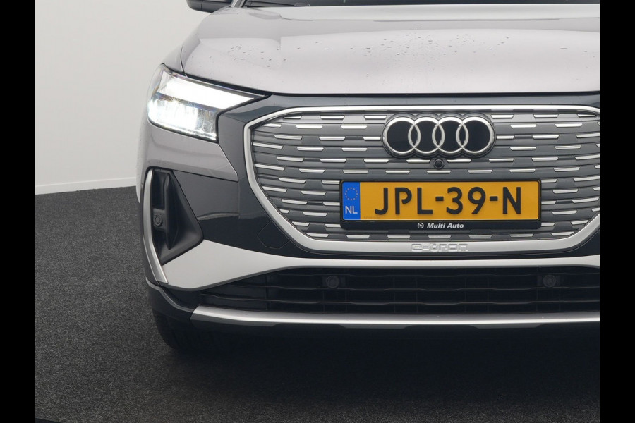 Audi Q4 e-tron 50 quattro S-Line 77 kWh 299pk Dealer O.H. Incl. BTW | Panodak | SOH 93,2% | Lederen Sportstoelen Verwarmd | 20"L.M  | Navigatie | Cruise Control | Virtual | DAB | Taifungrau Metallic |