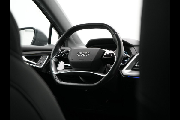 Audi Q4 e-tron 50 quattro S-Line 77 kWh 299pk Dealer O.H. Incl. BTW | Panodak | SOH 93,2% | Lederen Sportstoelen Verwarmd | 20"L.M  | Navigatie | Cruise Control | Virtual | DAB | Taifungrau Metallic |