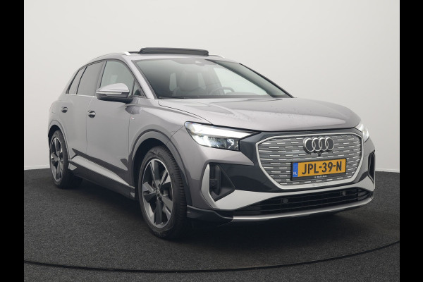 Audi Q4 e-tron 50 quattro S-Line 77 kWh 299pk Dealer O.H. Incl. BTW | Panodak | SOH 93,2% | Lederen Sportstoelen Verwarmd | 20"L.M  | Navigatie | Cruise Control | Virtual | DAB | Taifungrau Metallic |