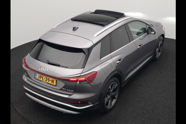 Audi Q4 e-tron 50 quattro S-Line 77 kWh 299pk Dealer O.H. Incl. BTW | Panodak | SOH 93,2% | Lederen Sportstoelen Verwarmd | 20"L.M  | Navigatie | Cruise Control | Virtual | DAB | Taifungrau Metallic |