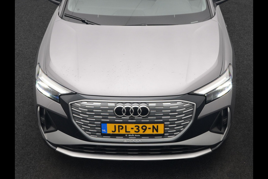 Audi Q4 e-tron 50 quattro S-Line 77 kWh 299pk Dealer O.H. Incl. BTW | Panodak | SOH 93,2% | Lederen Sportstoelen Verwarmd | 20"L.M  | Navigatie | Cruise Control | Virtual | DAB | Taifungrau Metallic |
