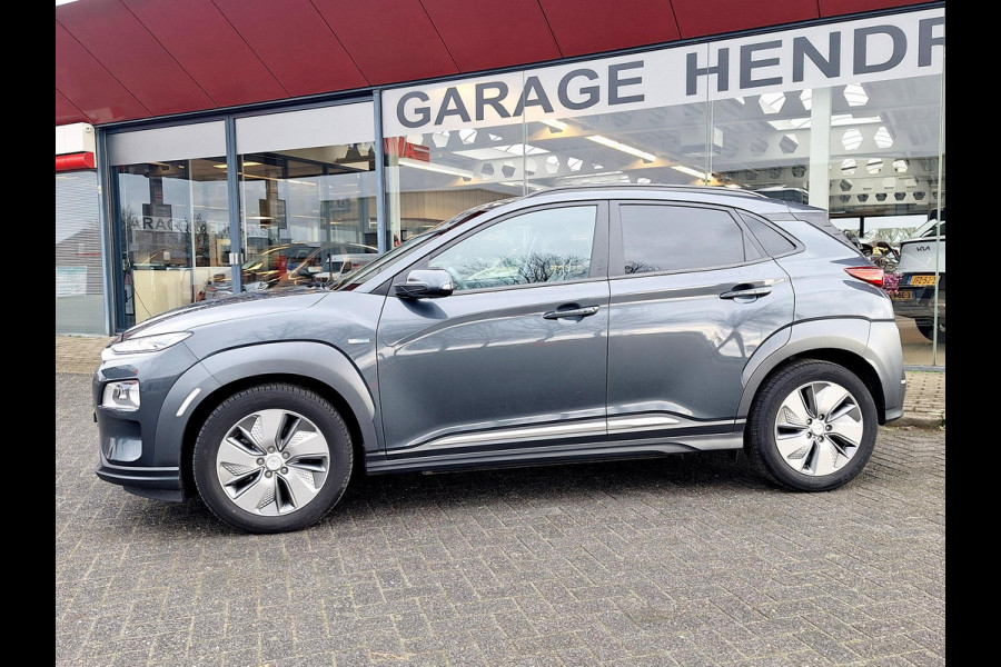 Hyundai Kona EV Premium 64 kWh | SOH: 94,6% | Leder | Warmtepomp | Adaptive CC | Navi | Camera |