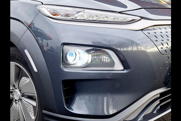 Hyundai Kona EV Premium 64 kWh | SOH: 94,6% | Leder | Warmtepomp | Adaptive CC | Navi | Camera |
