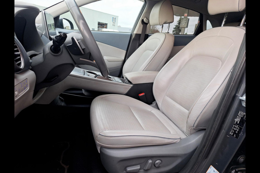 Hyundai Kona EV Premium 64 kWh | SOH: 94,6% | Leder | Warmtepomp | Adaptive CC | Navi | Camera |