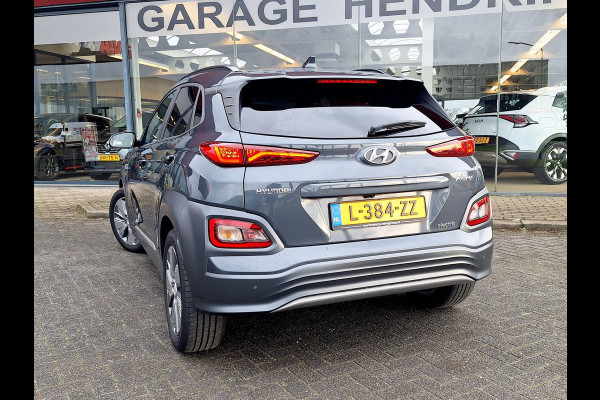 Hyundai Kona EV Premium 64 kWh | SOH: 94,6% | Leder | Warmtepomp | Adaptive CC | Navi | Camera |