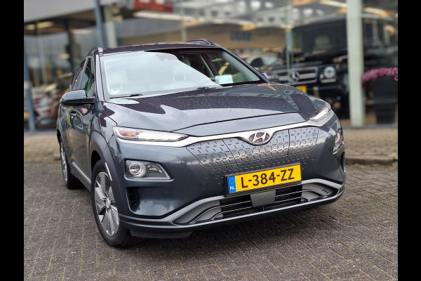 Hyundai Kona EV Premium 64 kWh | SOH: 94,6% | Leder | Warmtepomp | Adaptive CC | Navi | Camera |