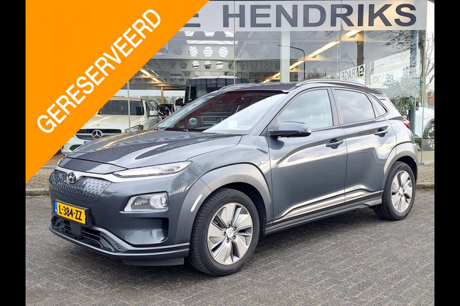 Hyundai Kona EV Premium 64 kWh | SOH: 94,6% | Leder | Warmtepomp | Adaptive CC | Navi | Camera |