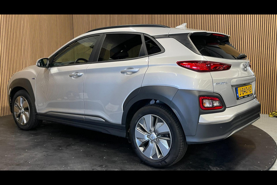 Hyundai Kona EV Fashion 64 kWh|100% SOH|FACELIFT|3-FASE|1/2 LEDER|ACC|NAVI|CAMERA|CARPLAY|STOELVERW|NAVI|ORG.NL|NAP|1e EIG.|IN.BTW