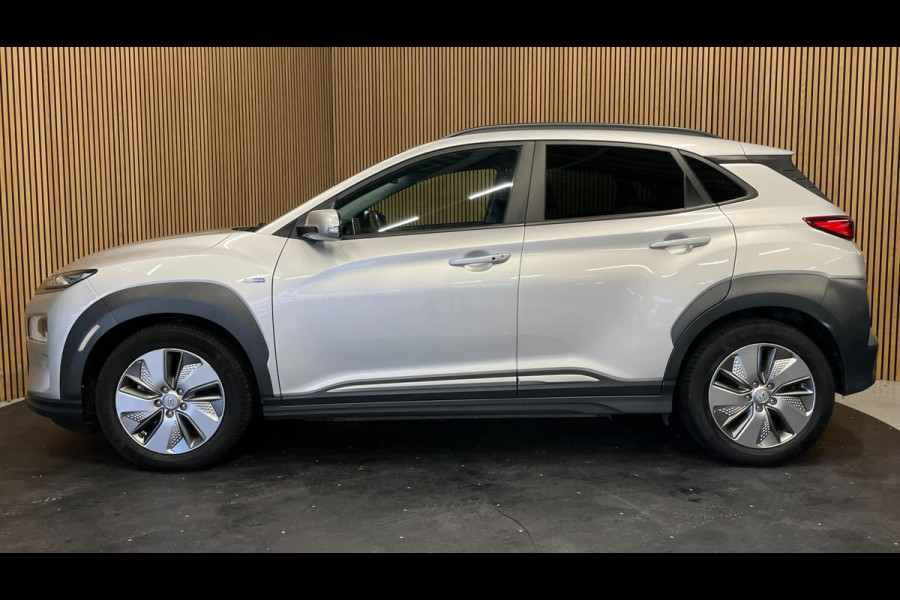 Hyundai Kona EV Fashion 64 kWh|100% SOH|FACELIFT|3-FASE|1/2 LEDER|ACC|NAVI|CAMERA|CARPLAY|STOELVERW|NAVI|ORG.NL|NAP|1e EIG.|IN.BTW