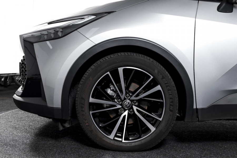 Toyota C-HR 1.8 Hybrid 140 Executive | Dig. Cockpit | Adapt. Cruise | Stoel-+Stuurverw. | Elek. Stoel | PDC | Camera | NAV + App. Connect | ECC | Elek. Klep  | LM 19" | 0023