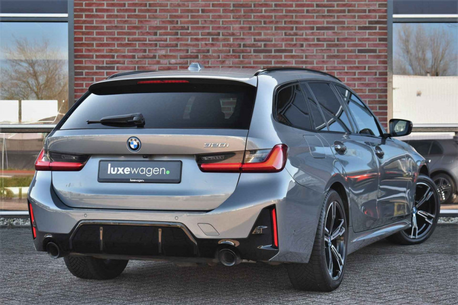 BMW 3 Serie Touring 320i M-Sport Pro Pano HUD HiFi Camera