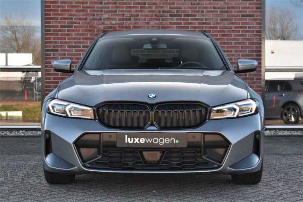 BMW 3 Serie Touring 320i M-Sport Pro Pano HUD HiFi Camera