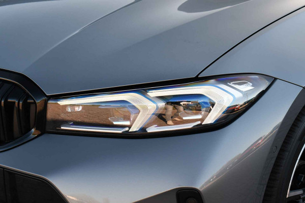 BMW 3 Serie Touring 320i M-Sport Pro Pano HUD HiFi Camera