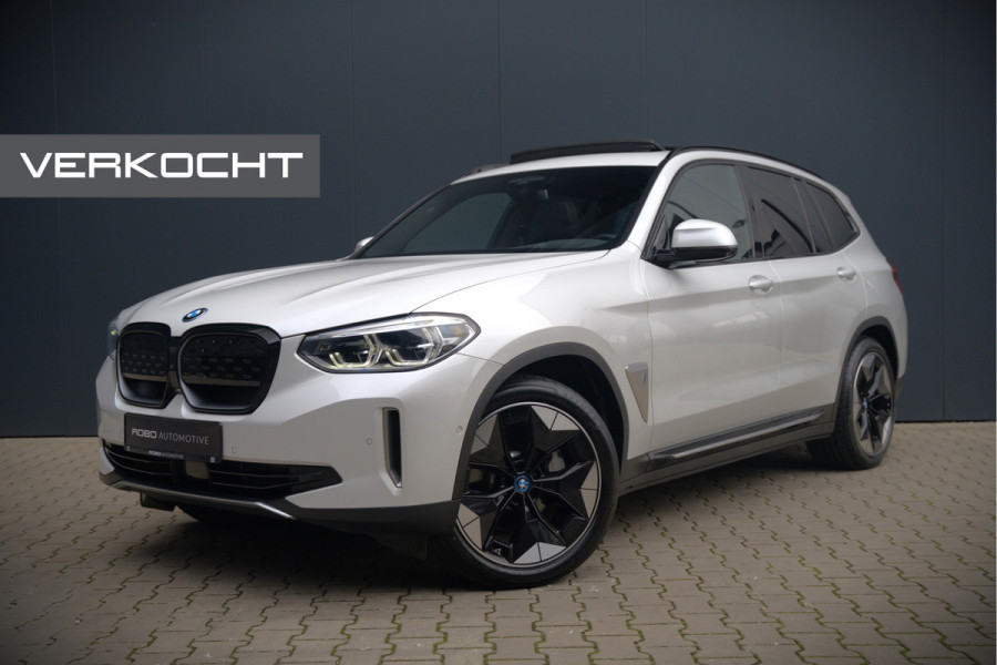 BMW iX3 High Executive 80 kWh | Panoramadak | Keyless | Stoelverwarming | Harman Kardon | Memory Seat | Head-Up Display | 360 Camera | Adaptief Onderstel | Trekhaak | Adaptive LED | Elektrische Stoelen | Apple Carplay | N