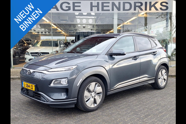 Hyundai Kona EV Premium 64 kWh | SOH: 94,6% | Leder | Warmtepomp | Adaptive CC | Navi | Camera |