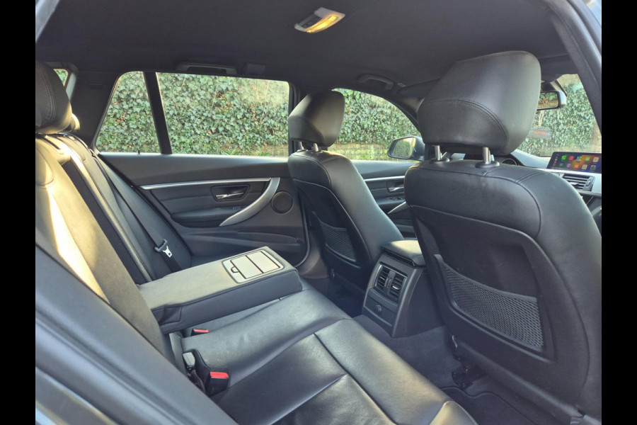 BMW 3 Serie Touring Nbt EVO Apple CarPlay LM Velgen Trekhaak NAP NL Gave Kleur 320i Luxury Edition