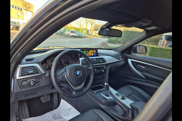 BMW 3 Serie Touring Nbt EVO Apple CarPlay LM Velgen Trekhaak NAP NL Gave Kleur 320i Luxury Edition